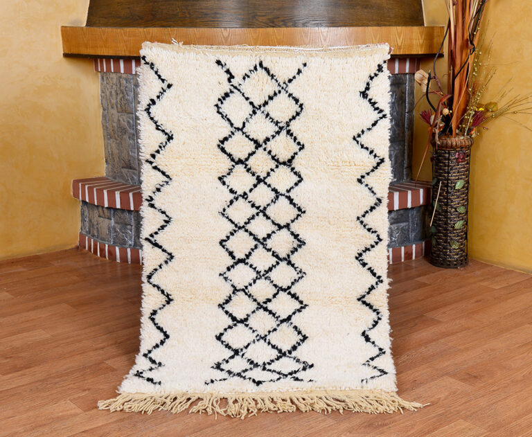 Moroccan wool rug featuring an azilal rug design. A stunning handmade wool rug that serves as a beautiful berber rug and handmade moroccan rug.