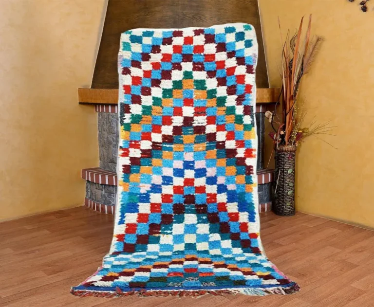 Vintage berber rug meticulously handwoven from natural wool in the High Atlas Mountains. A stunning handmade vintage rug serving as an elegant moroccan rug and authentic berber rug.