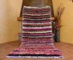 Add timeless beauty to your space with this vintage moroccan wool rug. A beautiful artisanal piece, this rug stands out as a genuine moroccan wool rug and premium berber rug.