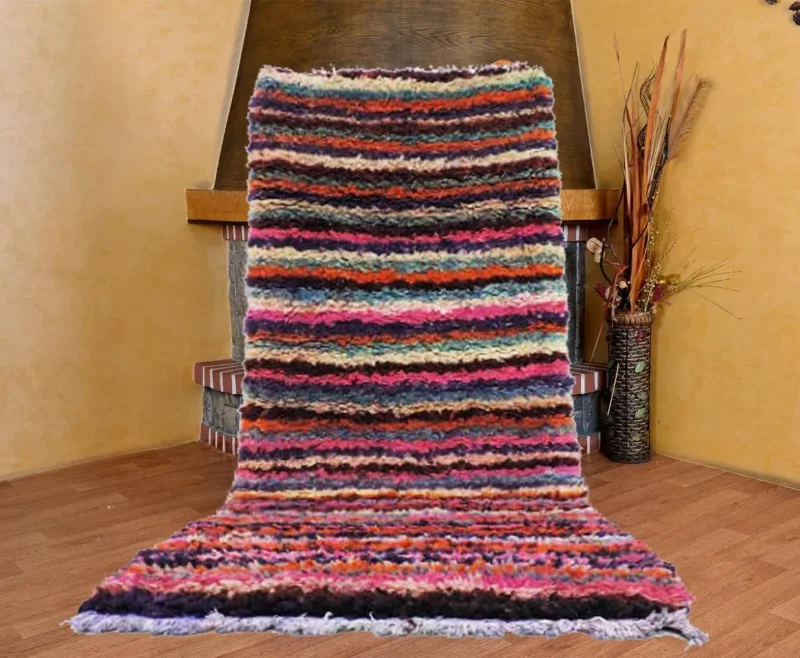 Add timeless beauty to your space with this vintage moroccan wool rug. A beautiful artisanal piece, this rug stands out as a genuine moroccan wool rug and premium berber rug.