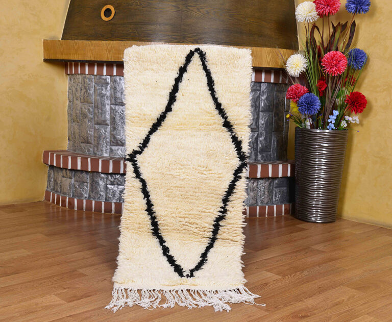 Elevate your space with this moroccan runner rug. A beautiful handmade wool rug, this moroccan berber rug and berber runner rug brings authentic style to any home.
